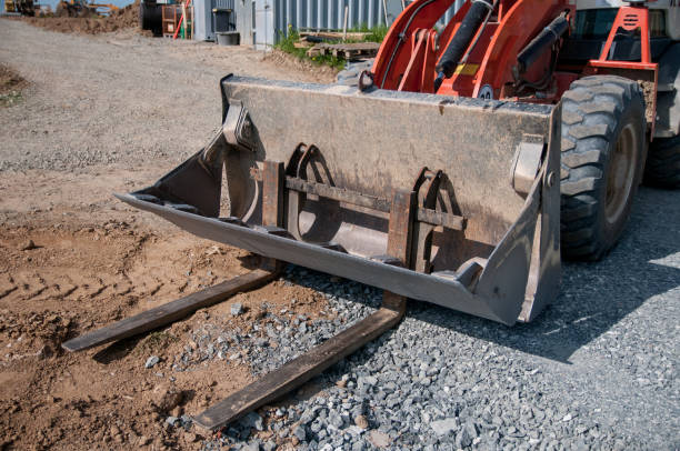 istock Road grader - heavy earth moving road construction equipment 694588722