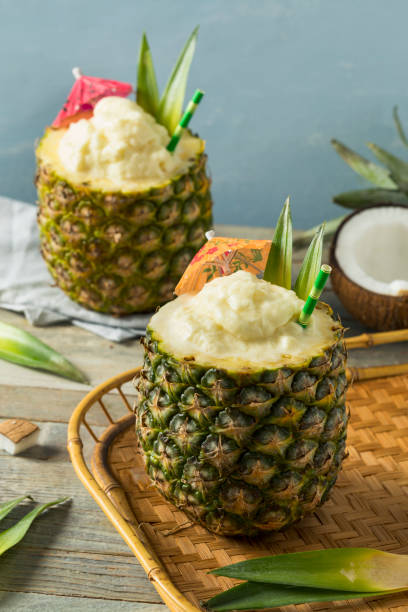 istock Frozen Pina Colada Cocktail in a Pineapple 694590762