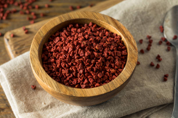 istock Raw Red Organic Annatto Seeds 694593432