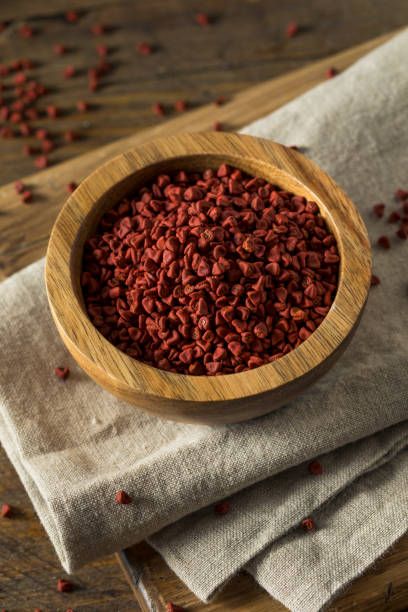istock Raw Red Organic Annatto Seeds 694598256