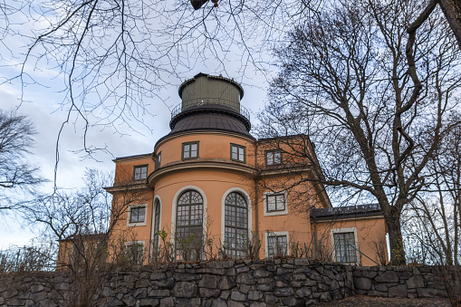 Stockholm, Sweden - November 20, 2016: The Stockholm Observatory sits on top of the hill, and Stockholm Public Library and the Stockholm School of Economics' main building lie at its edges.