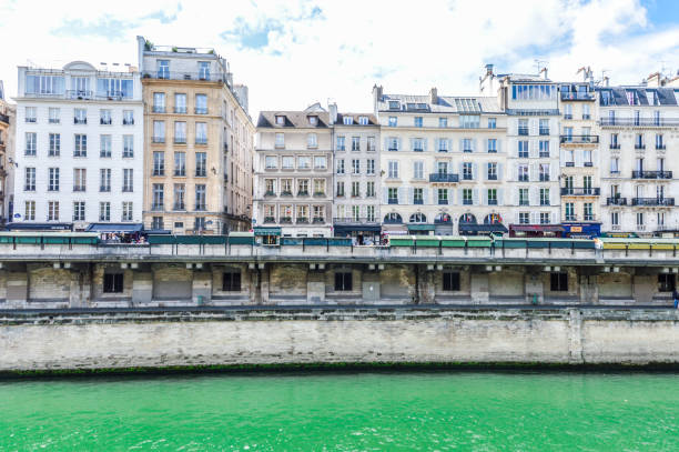 istock Paris street scene and architecture along the Seine River 694619438