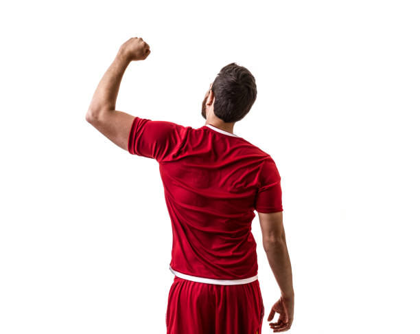 istock Fan / Sport Player on red uniform celebrating on white background 694620368