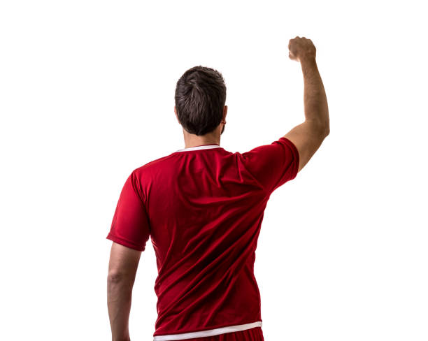 istock Fan / Sport Player on red uniform celebrating on white background 694620370