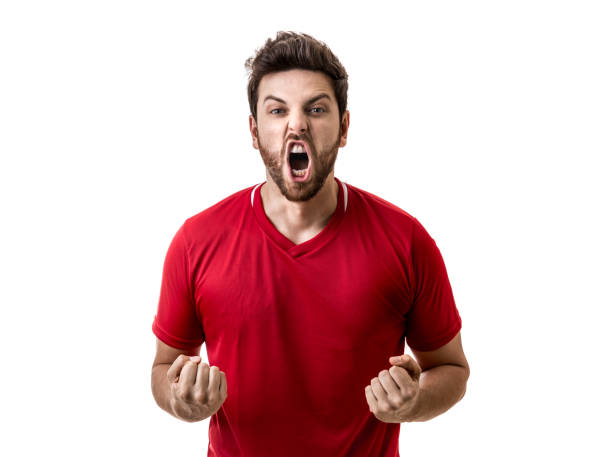 istock Fan / Sport Player on red uniform celebrating on white background 694622716