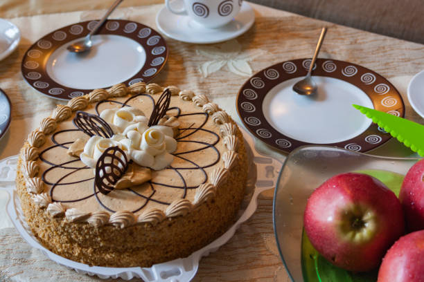 istock Fruit cheesecake with cups of tea 694640696