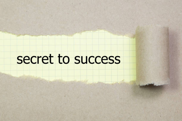 istock secret to success written under torn brown paper 694657696