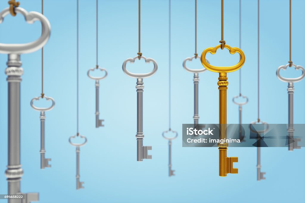 Hanging Keys Hanging skeleton keys on light blue background. Key Stock Photo