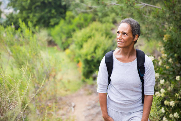 istock African American Senior Woman Exploring Backpacking 694670830
