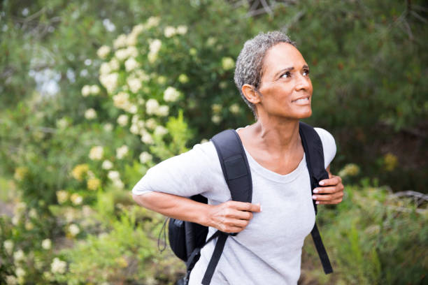 istock African American Senior Woman Exploring Backpacking 694670832