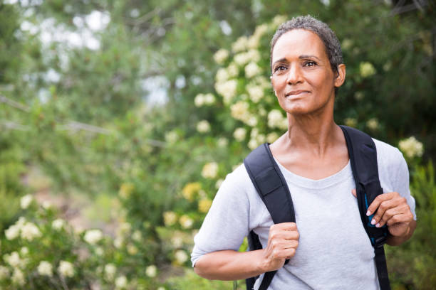 istock African American Senior Woman Exploring Backpacking 694671030