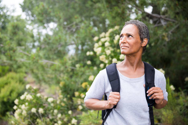 istock African American Senior Woman Exploring Backpacking 694671032