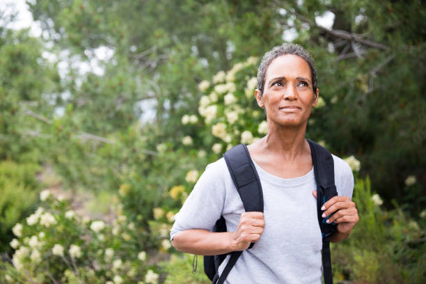 istock African American Senior Woman Exploring Backpacking 694671034