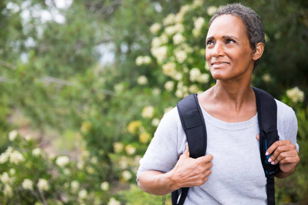 istock African American Senior Woman Exploring Backpacking 694671068