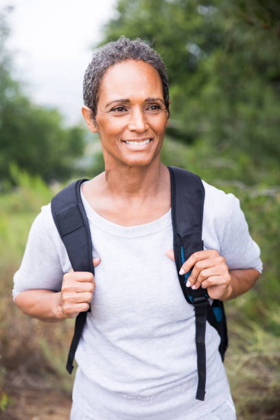 istock African American Senior Woman Exploring Backpacking 694671152