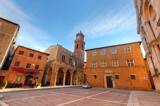 Old town of Pienza in Tuscany, Italy. Historic city center. Blue morning sky