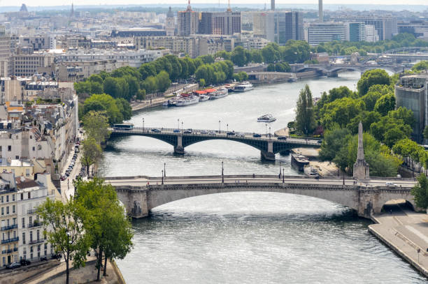 istock Paris street scene and architecture along the Seine River 694676668