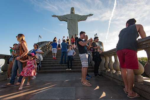 Rio de Janeiro, Brazil - May 24, 2017: People visiting Christ the Redeemer statue, enjoying the view, taking pictures.