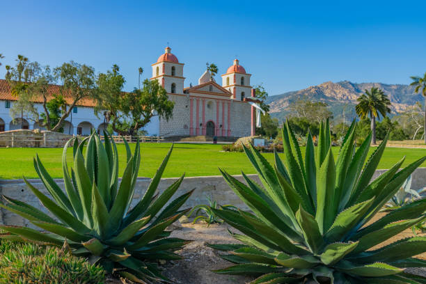 historic santa barbara mission with spring foliage, california - mission santa barbara imagens e fotografias de stock