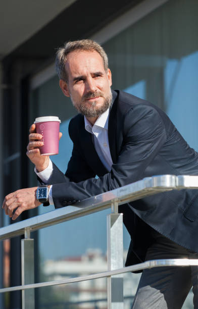 istock Businessman At Coffee Break 694706698