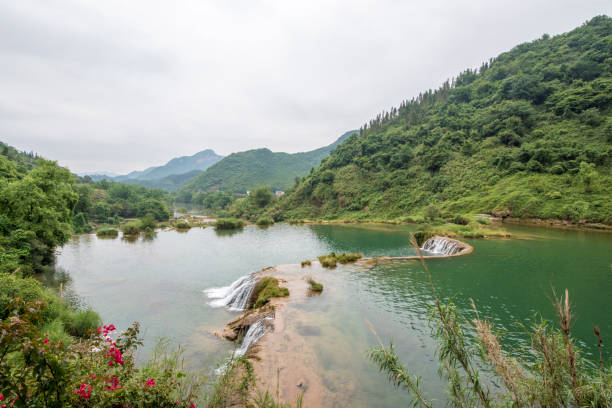 istock Jiulong waterfalls (nine dragon waterfalls) in Luoping, Yunnan province, China 694710038