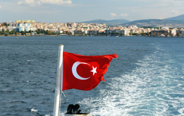 istock Flag of Turkey on ferry boat 694710524