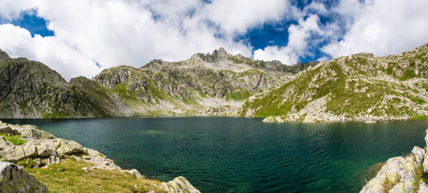 istock Panoramic view of mountain lake. 694712760