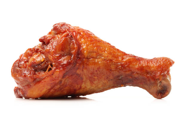istock Roasted chicken leg Isolated  on white background. 694722500