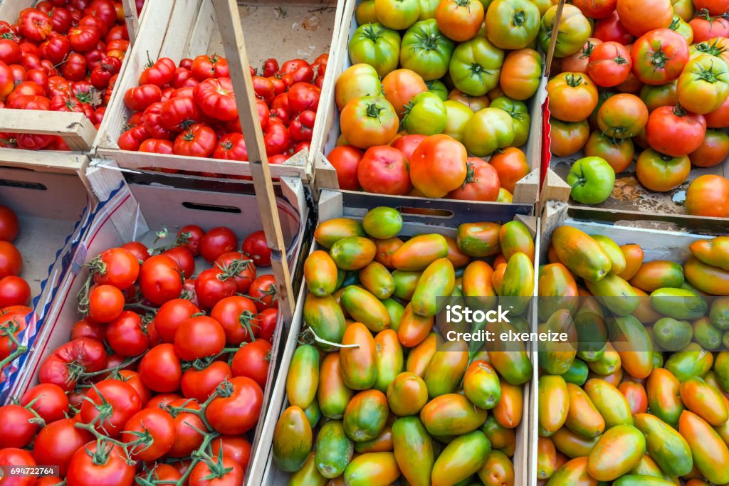 Tomatoes at a market in Palermo Tomatoes for sale at a market in Palermo Agriculture Stock Photo