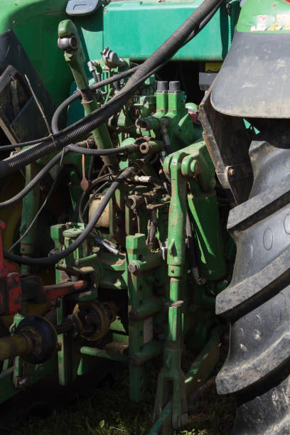 istock traktor machine wheels and details in summer in south german countryside 694722834