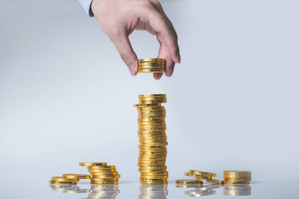 istock A large amount of coins, money 694725504