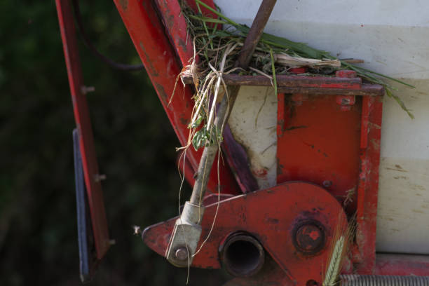 istock traktor machine wheels and details in summer in south german countryside 694725574