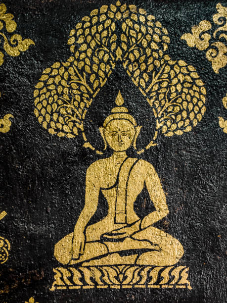Wat Xieng Thong ancient mural paintings Luang Prabang Laos