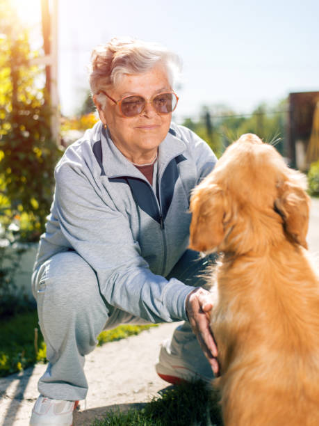 istock Senior woman and her dog 694733030