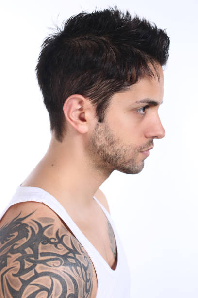 istock Portrait of a beautiful tattooed man 694736018
