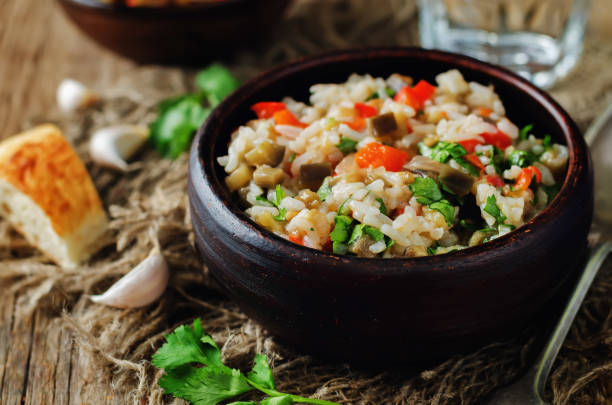 istock Red bell pepper eggplant cilantro rice 694736564