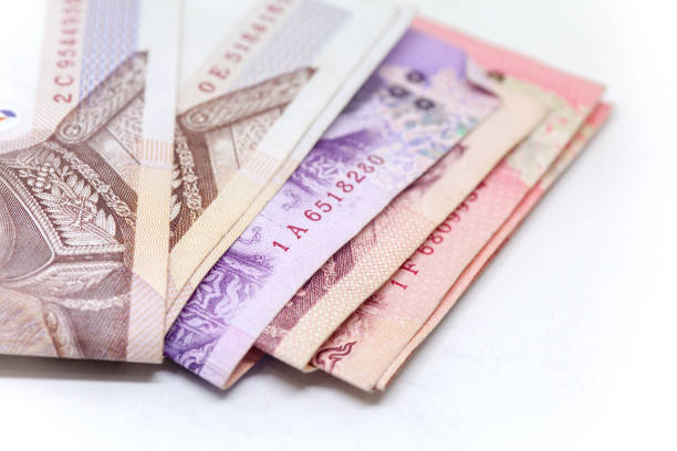 istock Thai currency in background and isolated, Thai bath cash 694739244