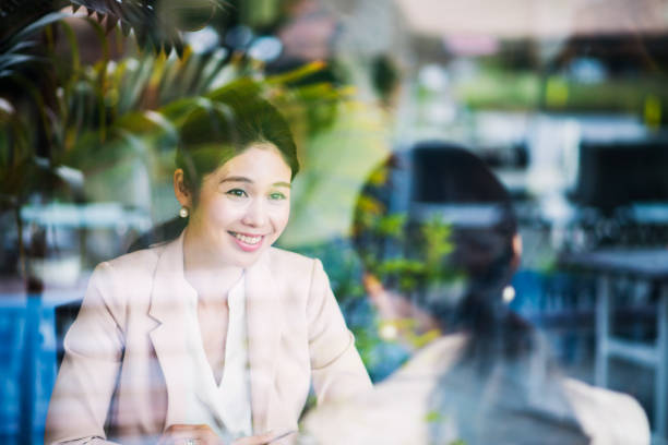 istock Business people meeting at cafe 694740040