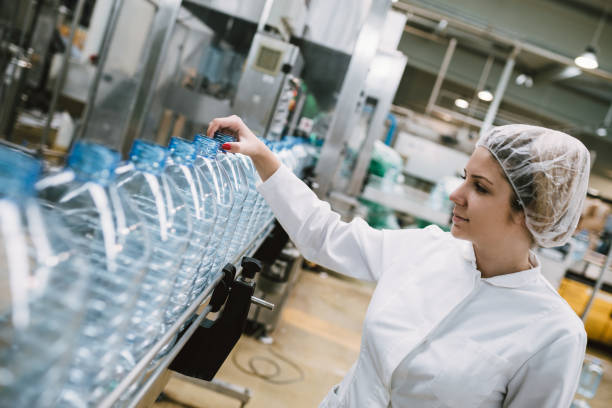 istock Young woman factory worker 694747398