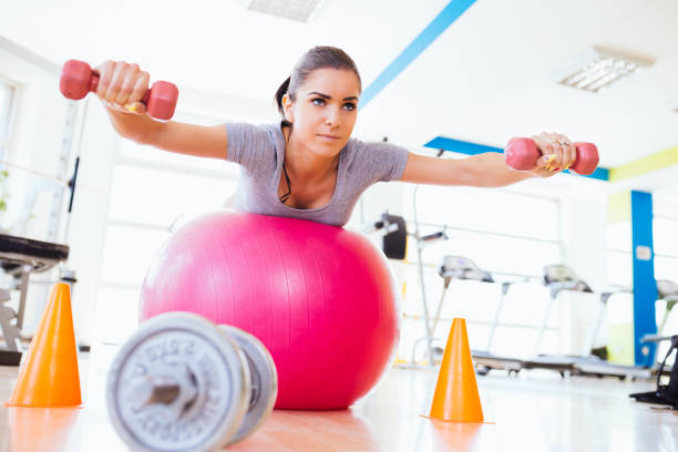 istock Young woman in gym 694750484