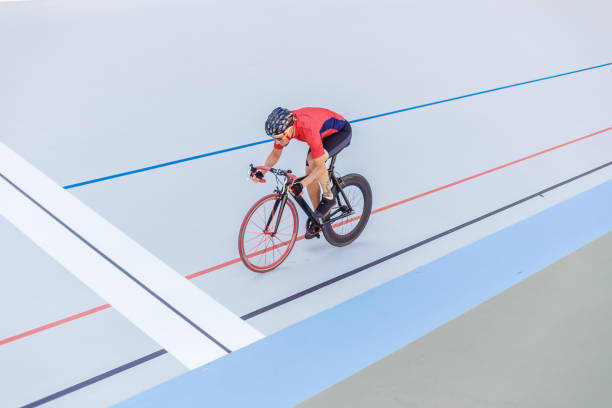 istock Cyclist finishes on velodrome 694764504