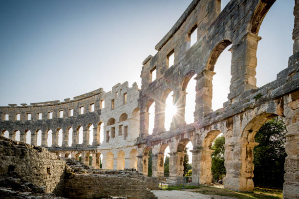 istock Pula Roman Amphitheater Croatia Sunset 694774394