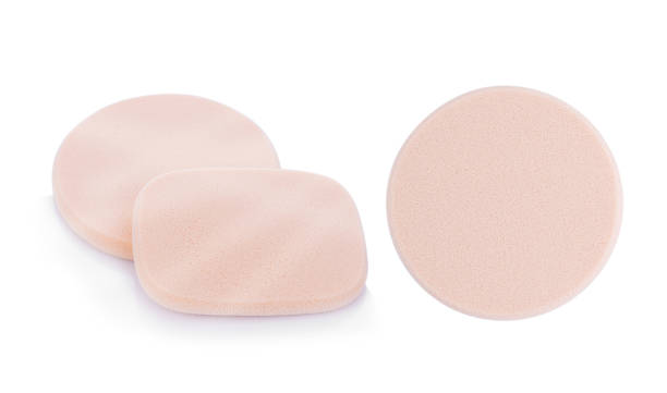 istock Cosmetic sponges on white background 694784986
