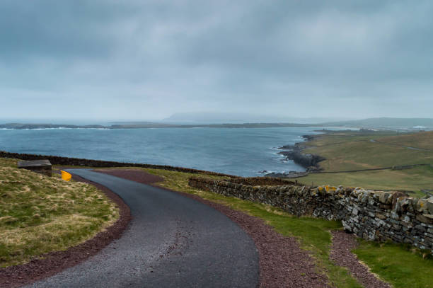 istock Empty road on the Shetland Island 694789502