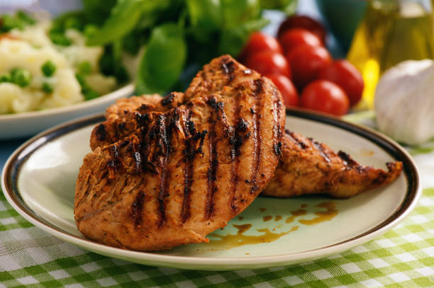 istock Grilled turkey fillet with mashed potatoes. 694792666