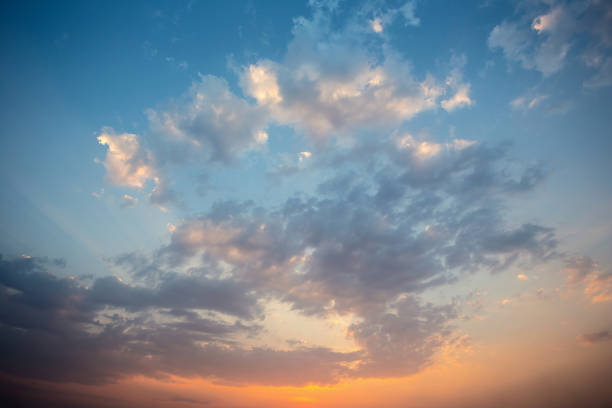 istock Colorful dramatic sky with cloud at sunset.Sky with sun background 694795530