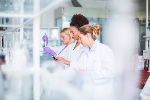 istock Youn scientists in a chemical laboratory 694812658