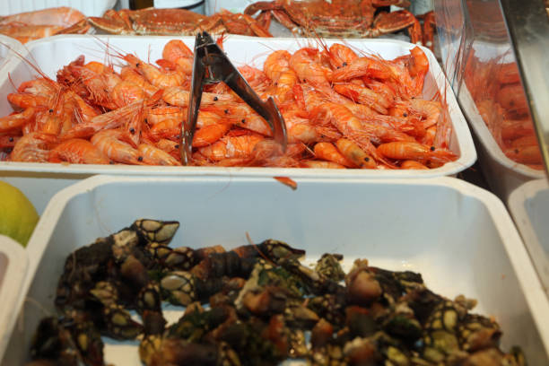 istock Fresh Shrimps on Fish Market in Madrid. Spain 694817678
