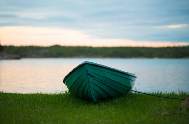 Fishing boat resting on shore, Åland Islands, Finland