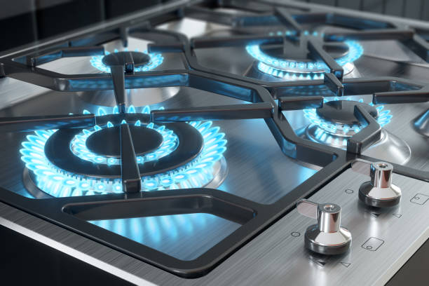 cocina con primeros planos de los quemadores. - gas ranges fotografías e imágenes de stock